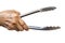 Senior woman right hand holding Stainless tongs for cooking on white background, Close up shot, Kitchen utensils concept