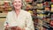 Senior woman shopping in grocery store