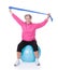 Senior woman stretching exercising equipment