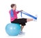 Senior woman stretching exercising equipment