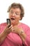 Senior Woman Texting on Cell Phone