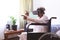 Senior woman using virtual realty headset at nursing home