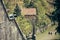 Senior woman walking hiking along the path of the historic pilgrimage route from Sacred Mount or Sacro Monte of Varese, Italy