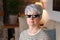 Senior woman wearing epic pixilated sunglasses