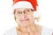 Senior Woman Wearing Santa Hat Over White Background