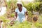 Senior Woman Working On Allotment