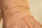 Senior woman wrinkled wrist of the arm, Close up