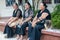 Senior women with dresses topped with traditional raffia decoration made from nature in Kingdom of Tonga.