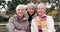 Senior, women and friends face in park sitting with retirement smile in a garden. Nature, portrait and hug with elderly
