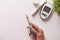 senior women holding Insulin pens with copy space, Top down