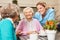 Senior women in retirement home drinking coffee