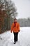 Senior women strawling in the winter snow