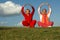 Senior women yoga outdoors