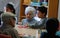 Seniors and childs during therapeutical activities on a nursing home in Mallorca