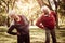 Seniors couple in sports clothing working stretching and