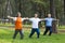 Seniors doing gymnastics in the park