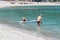 Seniors enjoying beach based leisure activities in the sea off Agios Ioannis beach, Lefkada, Greece