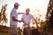 Seniors golfers men talking on golf court