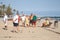 Seniors Spaniards play Bocce on a sandy beach