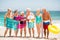 Seniors standing in a row at the beach