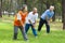 Seniors are warming up before jogging in the park