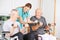 Seniors in a wheelchair during fitness training