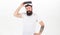 Sensational feelings of using VR headset. Man bearded hipster with virtual reality headset on white background isolated