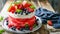 Sensational Sweet Delight: Magnificent Watermelon Cake adorned with Whipped Cream, Berries, and Frui