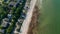 Sensational travel summertime destination high aerial view of tourist beach in Baltic sea in Scharbeutz, Germany, tilt