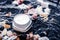 Sensitive skincare moisturizer beauty face cream on water and sea shells background, luxury anti-age cosmetics