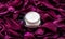 Sensitive skincare moisturizer cream on purple flower petals background, natural science for skin