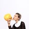 Sensual blonde in a nun costume with gold skull. Role-playing games, halloween, ego, .psychology concept