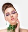 Sensual Brunette with Bright Purple Eye Make-up and Jewelry. Glamor