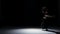 Sensual contemporary dance performance of two dancers on black, shadow