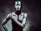 Sensual cyber woman with creative make-up. Technology and future concept. Isolated on a dark textured background.