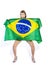 Sensual football supporter holding Brazil flag and looking