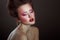 Sensual glamour portrait of beautiful woman creative makeup with