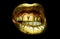 Sensual golden woman lips. Aggressive angry mouth. Womans gold lip. Female mouth close up.