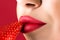 Sensual lips and strawberry closeup