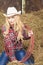 Sensual Passionate Caucasian Cowgirl With Lasso Rope in Farm