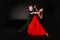 Sensual professional young dancers dancing tango in studio