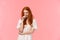 Sensual, romantic and sassy, seductive redhead daring woman in white dress, biting finger and coquettish look camera