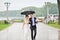 Sensual wedding couple, groom and bride laughing and walking tog