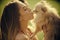 Sensual woman kiss cute spitz puppy, pet