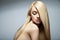 Sensual woman with shiny straight long blond hair