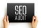 Seo Audit - process of analyzing how well your web presence relates to best practices, text concept on card