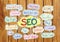 Seo Idea SEO Search Engine Optimization on wood background plank