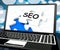 SEO On Laptop Shows Search Engine Optimization