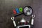 SEO Search engine optimization concept with alphabet abbreviation SEO and globe on magnifying glass and vintage robot