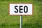 SEO - search engine optimization - signboard, grass in background